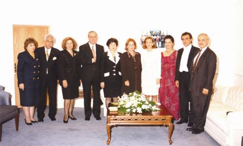 Mr. Talal Abu-Ghazaleh with some employees and their spouses at the musical concert for the organization's Silver Jubilee, Amman